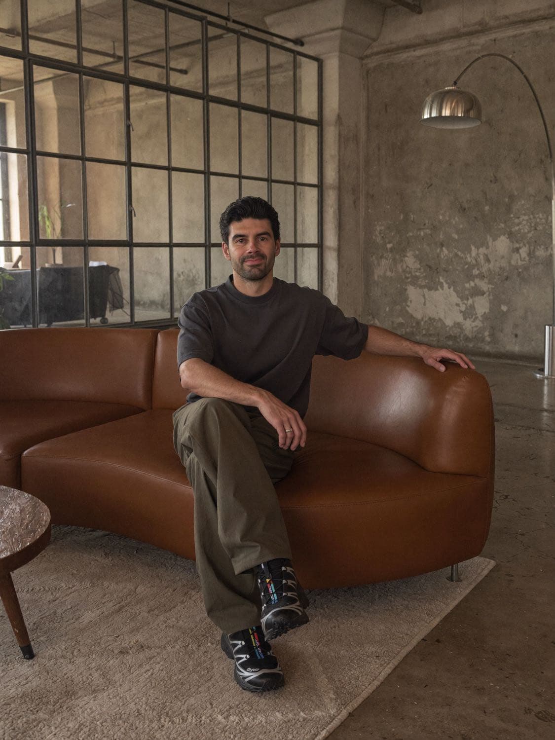 Caner Veli, founder of Purposeful Profits, in a loft studio
